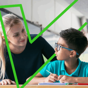 Primary school teacher guiding a student using positive behaviour support strategies